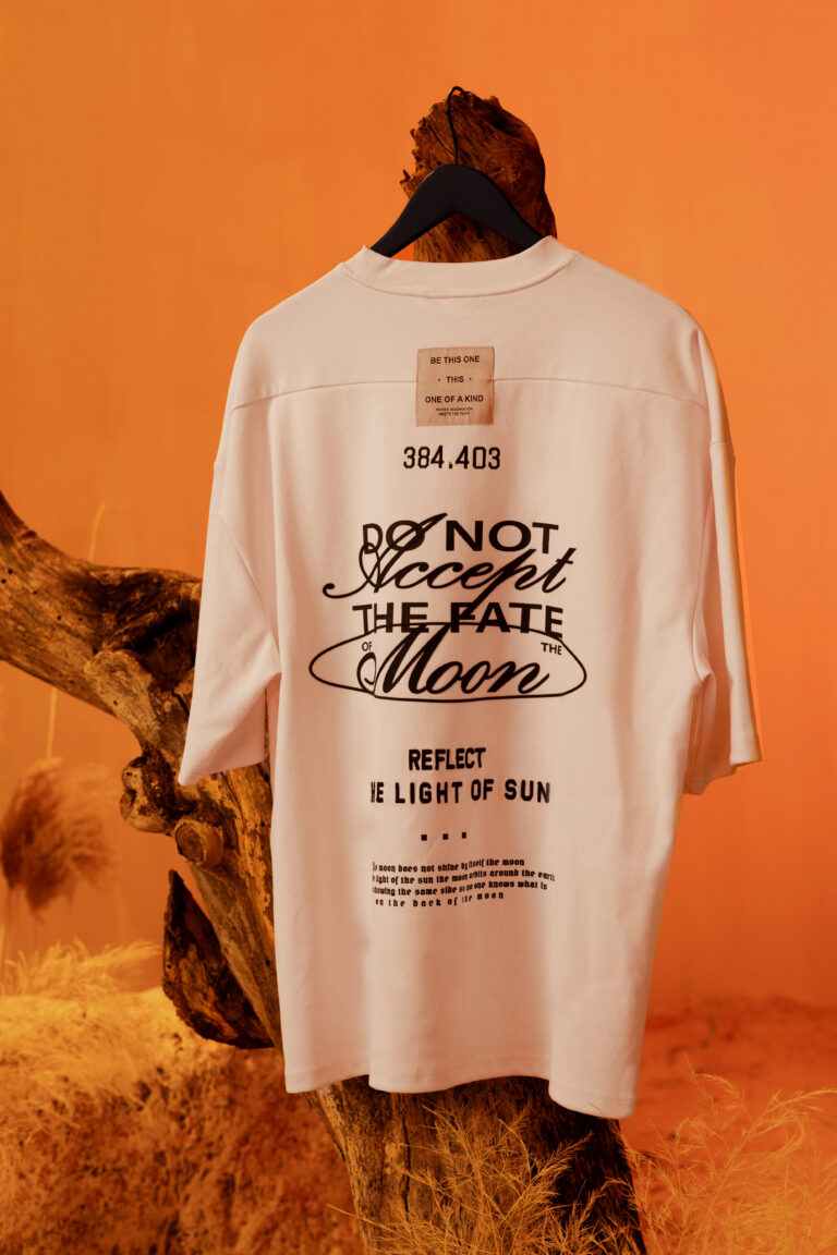a hanged t-shirt in an orange set